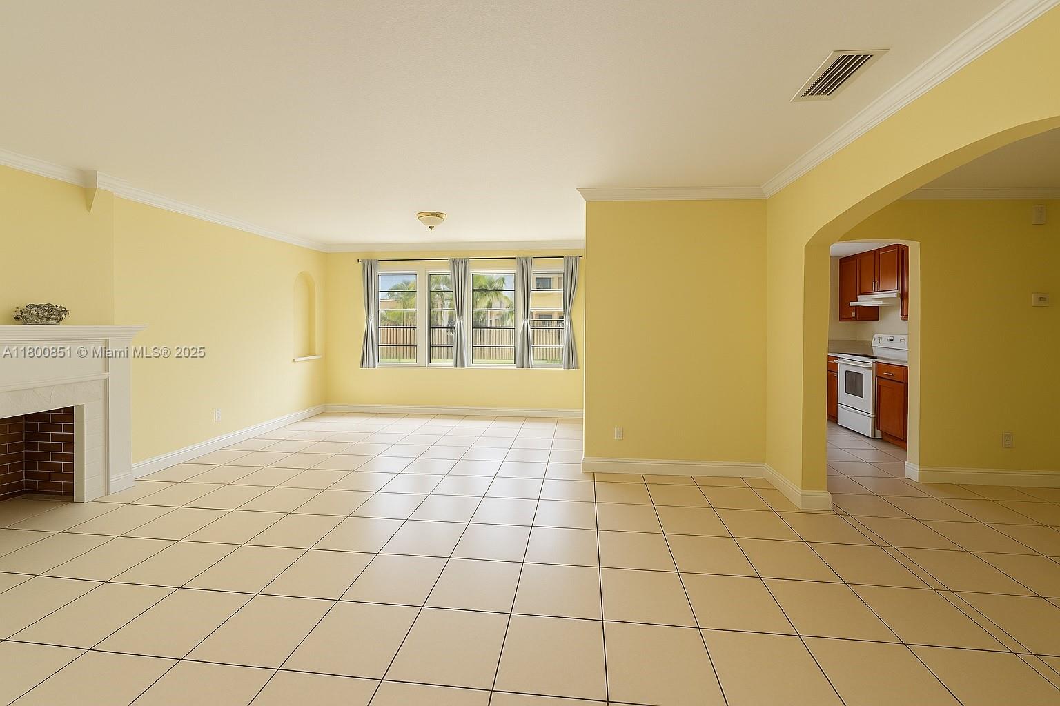 1741 Southwest 17th Court Miami, FL 33145 - Photo 2 of 13 a view of an empty room with glass door
