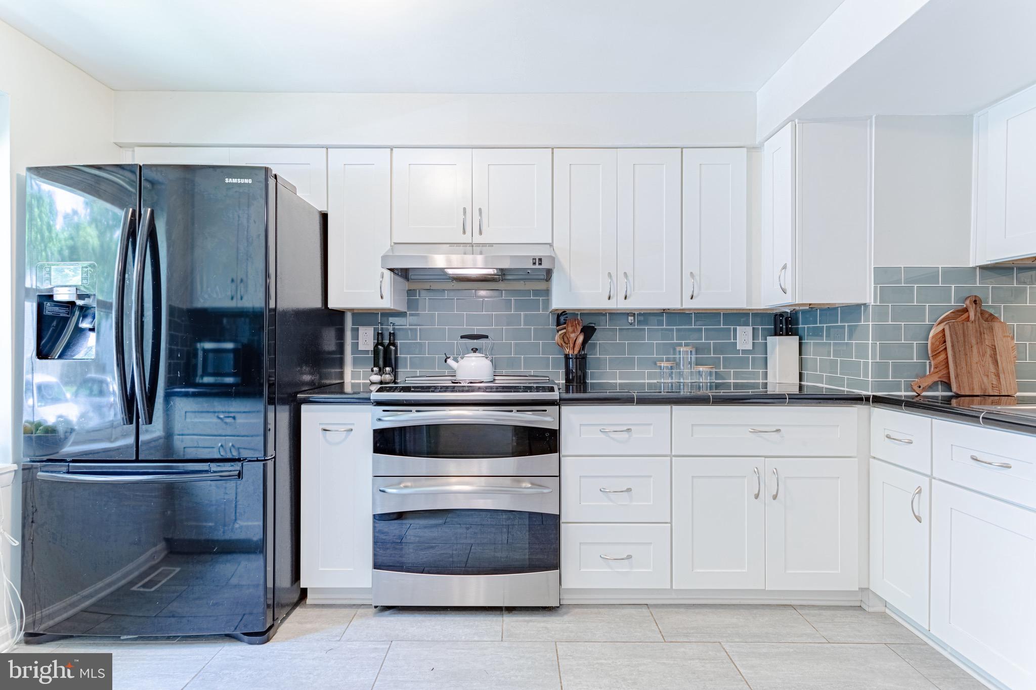 8325 Windfall Road Springfield, VA 22153 - Photo 11 of 34 Double oven and large refrigerator