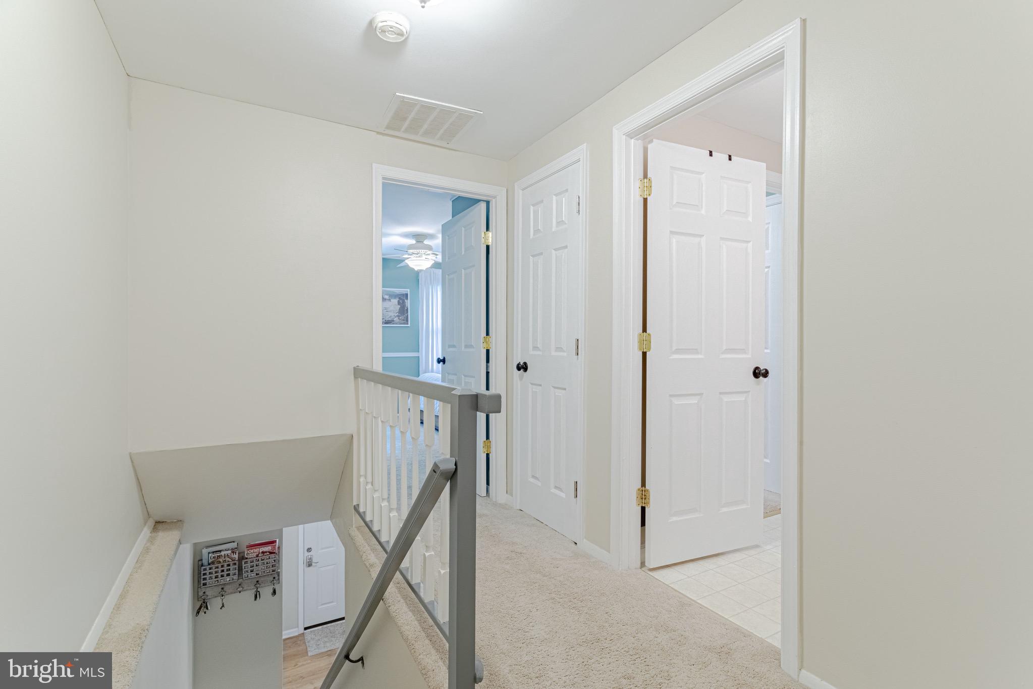 8325 Windfall Road Springfield, VA 22153 - Photo 18 of 34 Linen closet and entryway to Owner's suite & bath