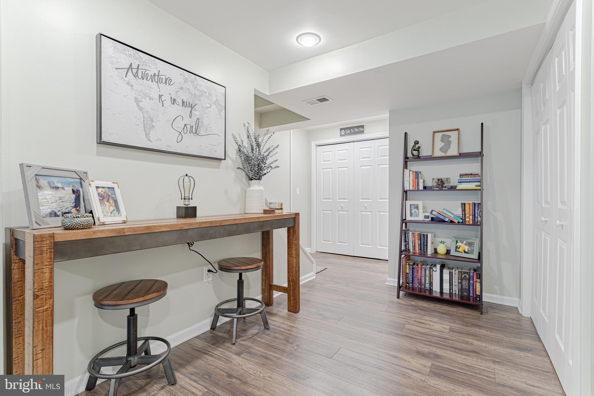 8325 Windfall Road Springfield, VA 22153 - Photo 23 of 34 Bar/seating space w/updated vinyl flooring