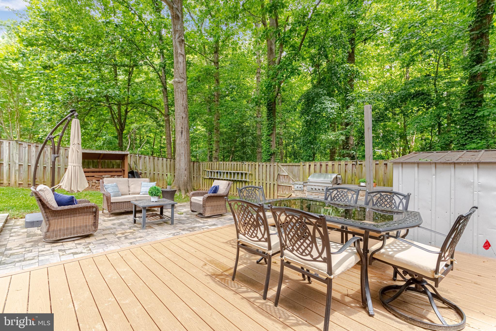 8325 Windfall Road Springfield, VA 22153 - Photo 27 of 34 Updated deck leading to stone patio