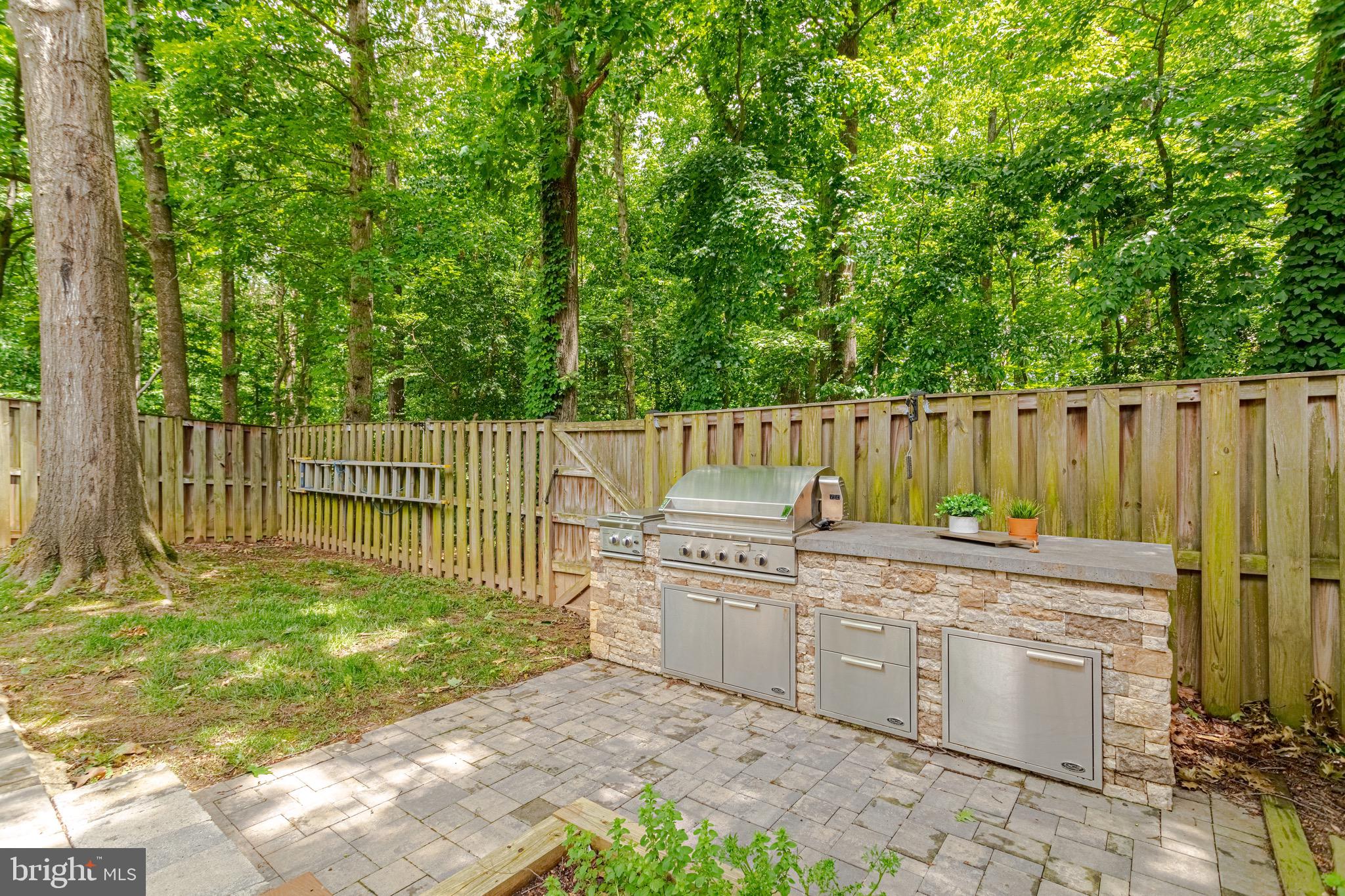 8325 Windfall Road Springfield, VA 22153 - Photo 28 of 34 Built in glass grill and outdoor kitchen