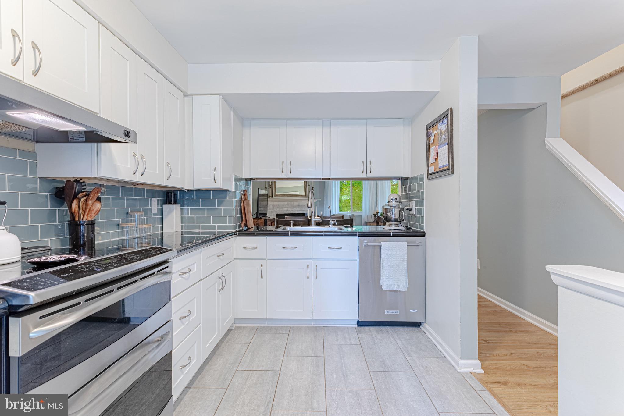 8325 Windfall Road Springfield, VA 22153 - Photo 9 of 34 Open concept w/ pass through to dining/living room