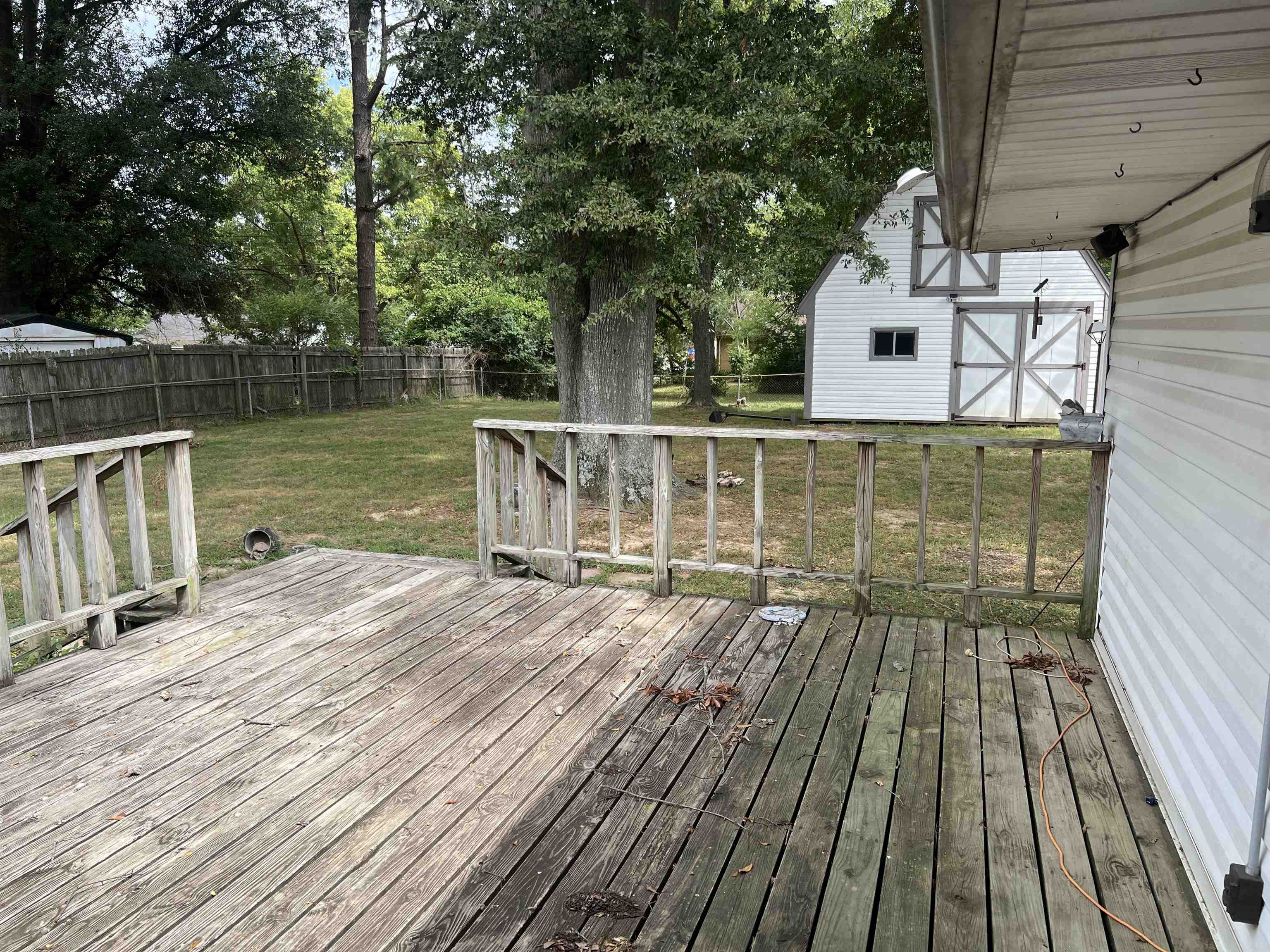 7202 Renda Street Millington, TN 38053 - Photo 5 of 18 a view of balcony with wooden floor and lake view