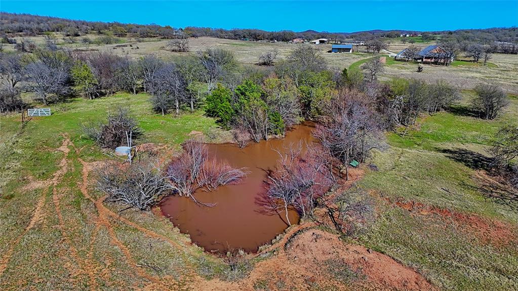 4460 Hildreth Pool Road Bowie, TX 76230 - Photo 35 of 40 an aerial view of a houses with a yard