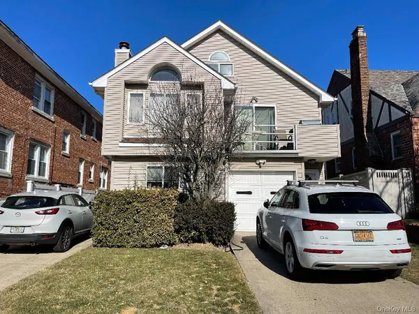 a car parked in front of a house