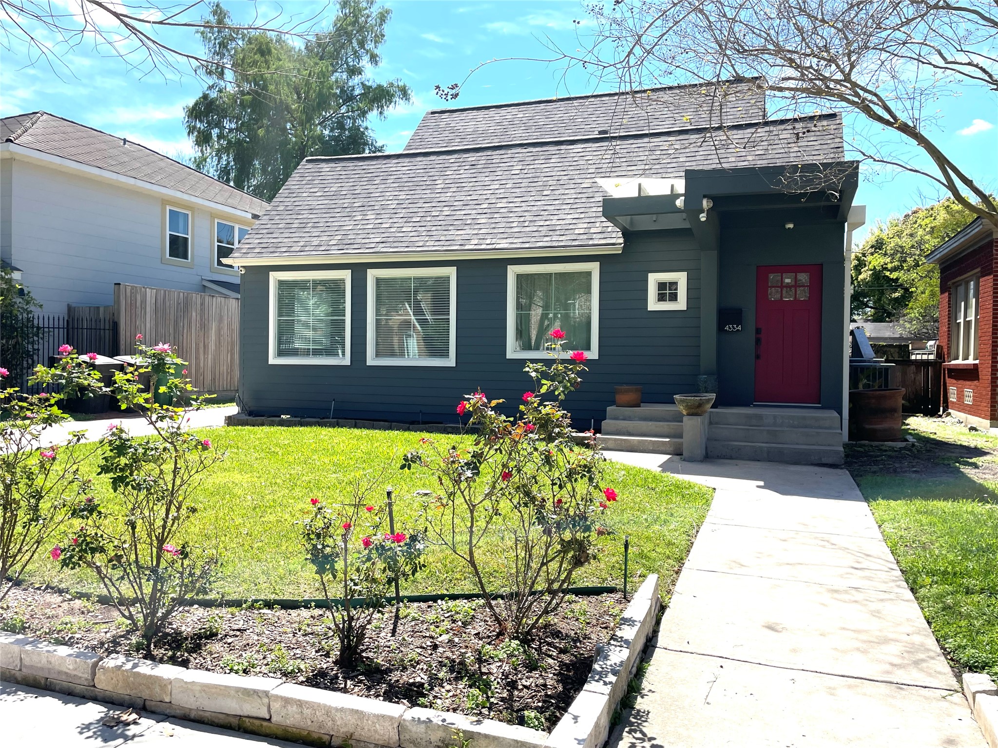 4334 Jefferson Street Houston, TX 77023 - Photo 1 of 31 a front view of a house with a yard