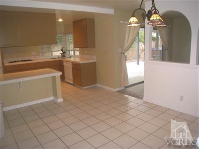 2958 Racine Street Simi Valley, CA 93065 - Photo 3 of 10 a bathroom with a sink a vanity and mirror