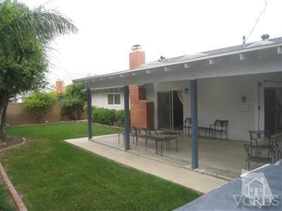 2958 Racine Street Simi Valley, CA 93065 - Photo 10 of 10 a view of a chair and table in backyard