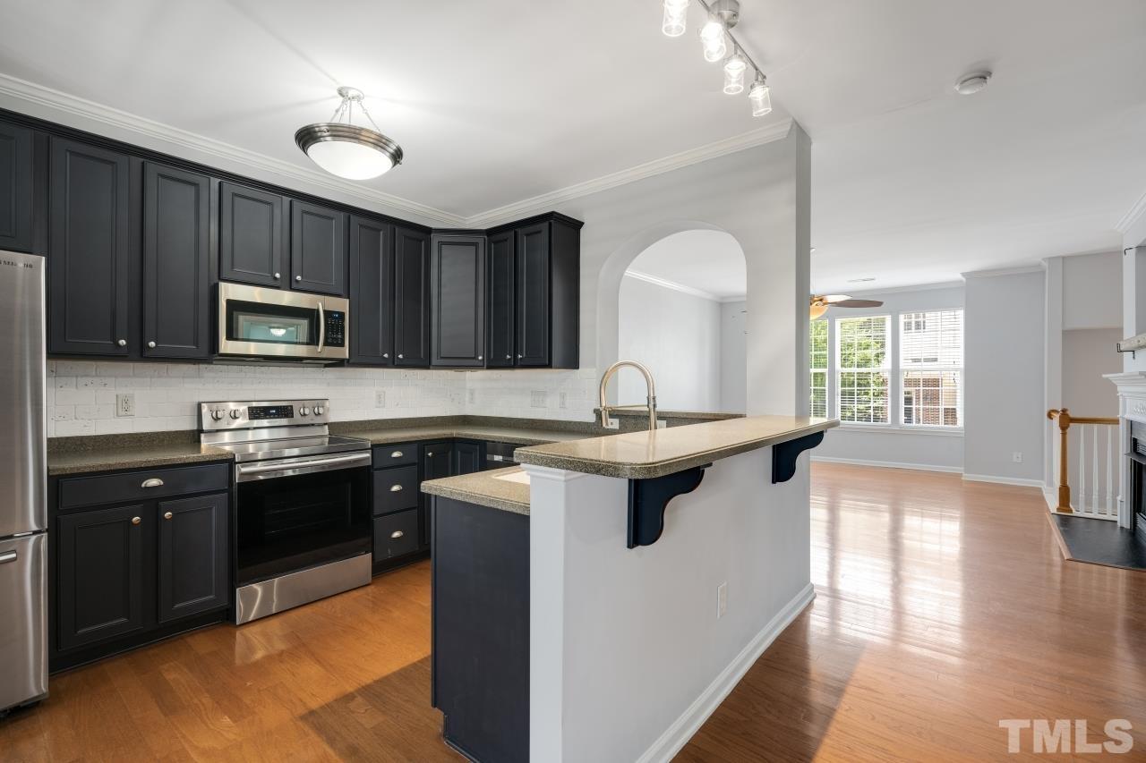 5429 Silver Moon Lane Raleigh, NC 27606 - Photo 25 of 26 Open floorplan; light and bright!