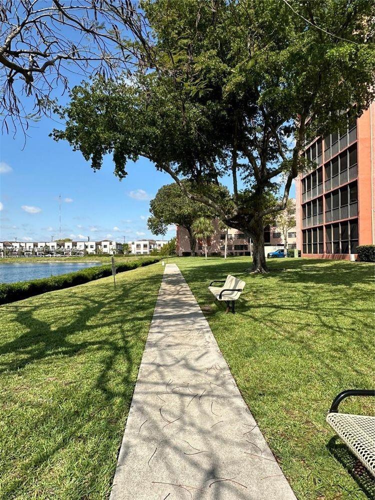 20860 San Simeon Way, Unit 3026 Miami, FL 33179 - Photo 13 of 17 a view of an outdoor space