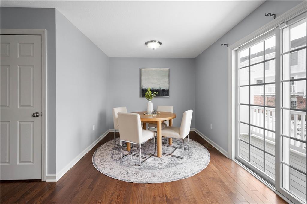 271 Overlook Court Coraopolis, PA 15108 - Photo 16 of 46 a dining room with furniture a rug and wooden floor