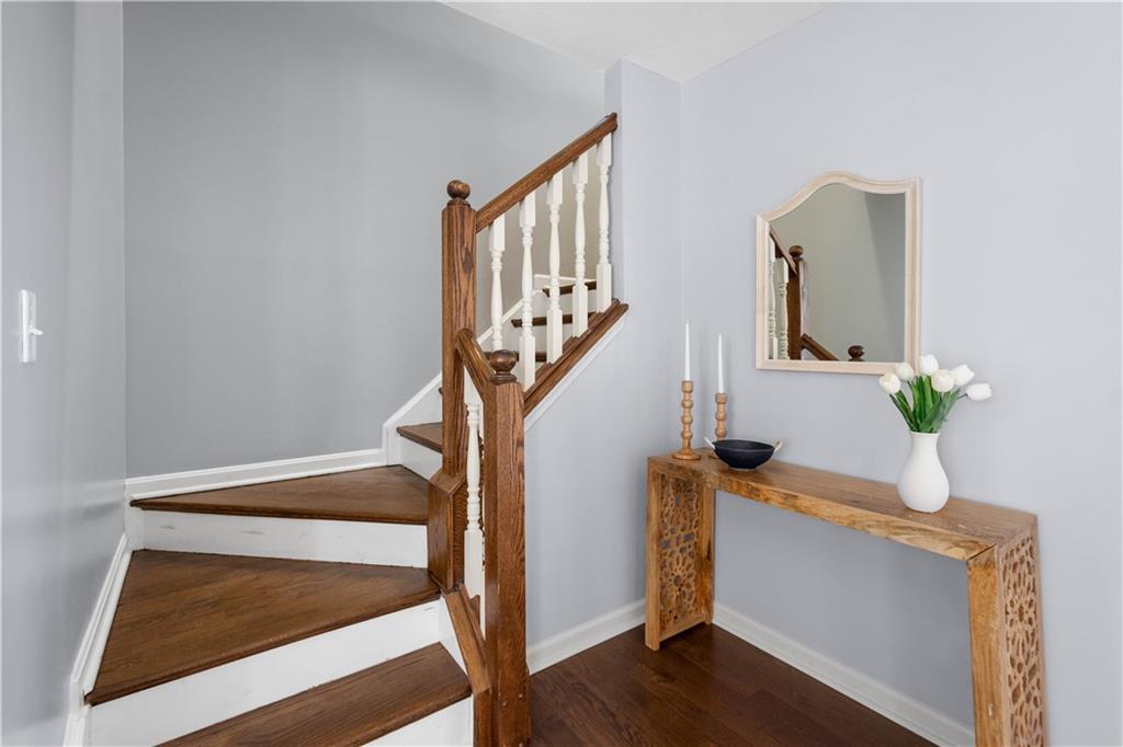 271 Overlook Court Coraopolis, PA 15108 - Photo 18 of 46 a view of staircase with wooden floor and potted plant