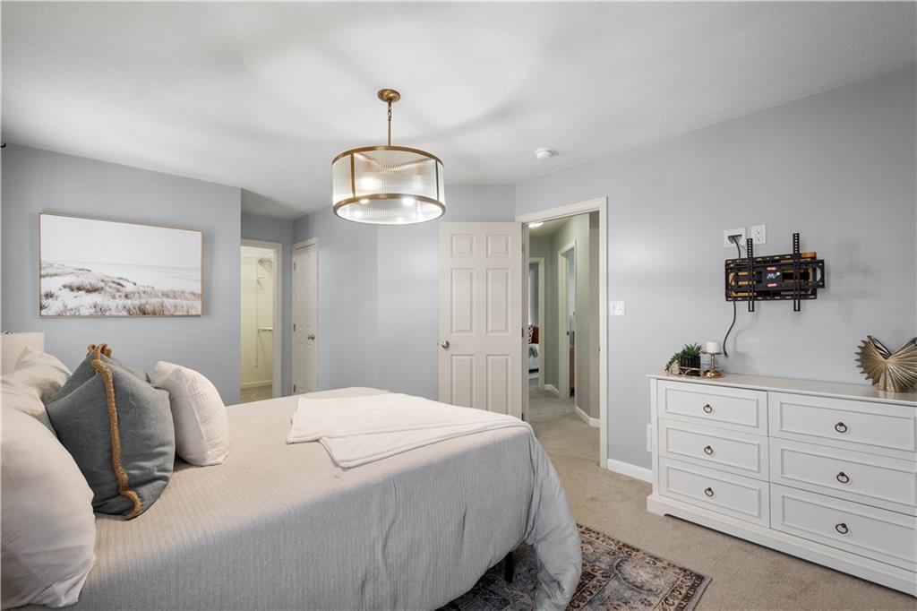 271 Overlook Court Coraopolis, PA 15108 - Photo 21 of 46 a bedroom with a bed and a dresser