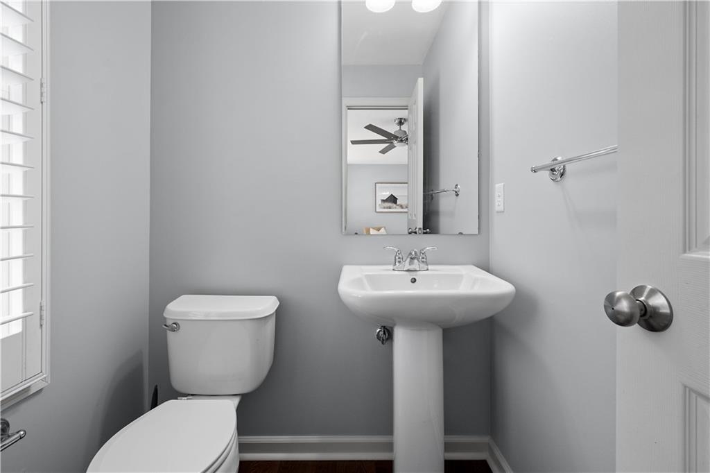 271 Overlook Court Coraopolis, PA 15108 - Photo 8 of 46 a bathroom with a toilet sink and mirror