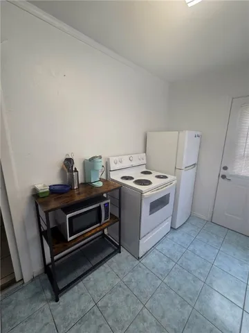 a utility room with washer and dryer