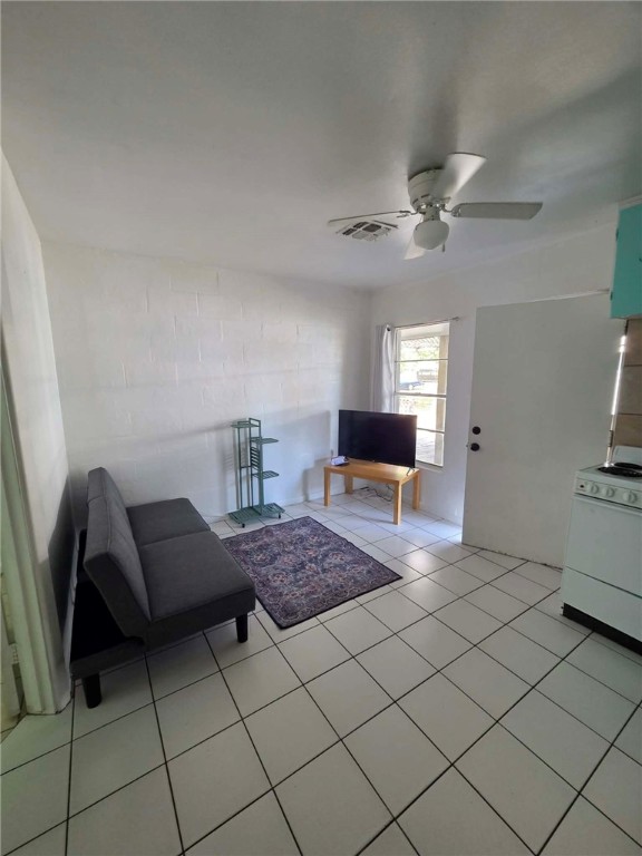 302 Broadway Street Fulton, TX 78382 - Photo 33 of 38 a bedroom with furniture and a chair