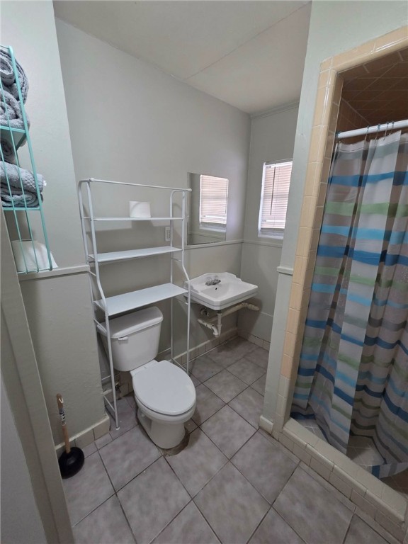 302 Broadway Street Fulton, TX 78382 - Photo 38 of 38 a bathroom with a toilet and a shower