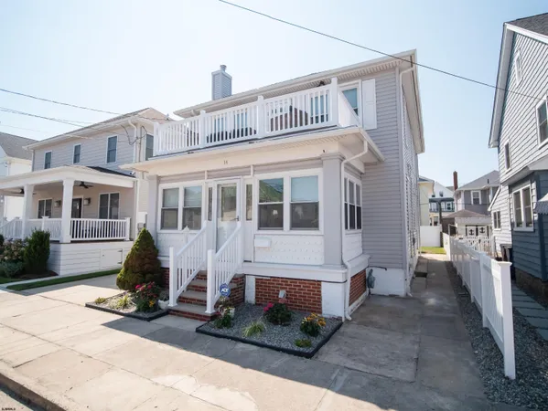 a view of a building with sitting area