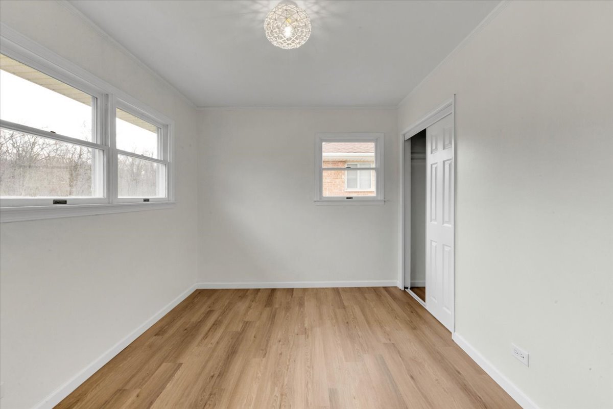 192 Monee Road Park Forest, IL 60466 - Photo 13 of 25 an empty room with a window