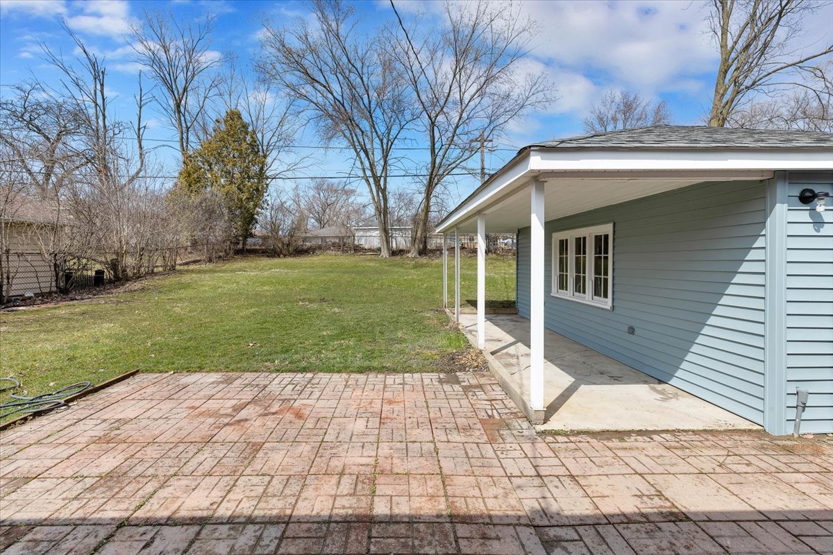 192 Monee Road Park Forest, IL 60466 - Photo 20 of 25 a front view of a house with a yard