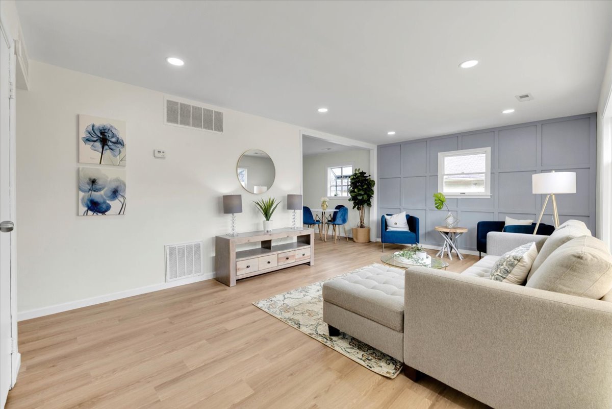 192 Monee Road Park Forest, IL 60466 - Photo 2 of 25 a living room with furniture and a wooden floor