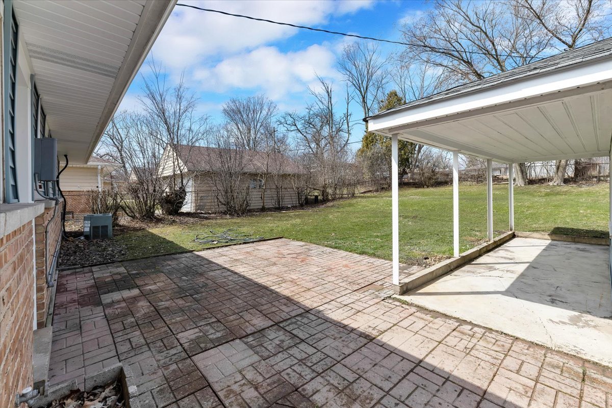 192 Monee Road Park Forest, IL 60466 - Photo 21 of 25 a view of a backyard with sitting area