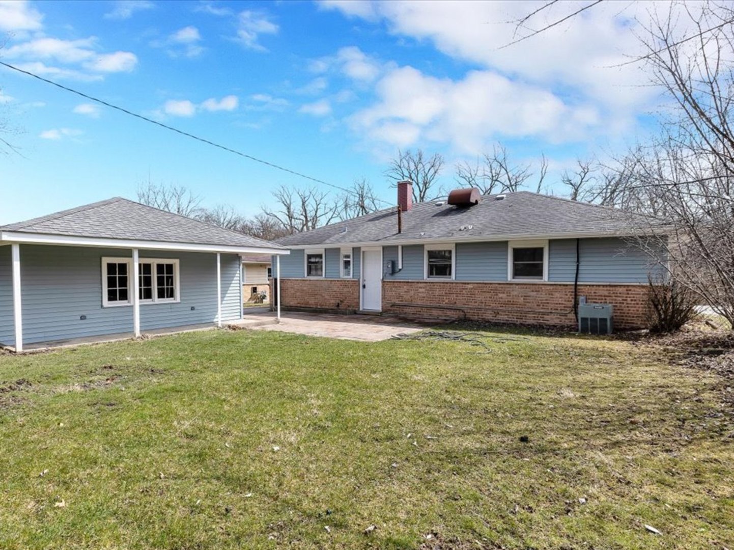 192 Monee Road Park Forest, IL 60466 - Photo 23 of 25 a front view of a house with a garden