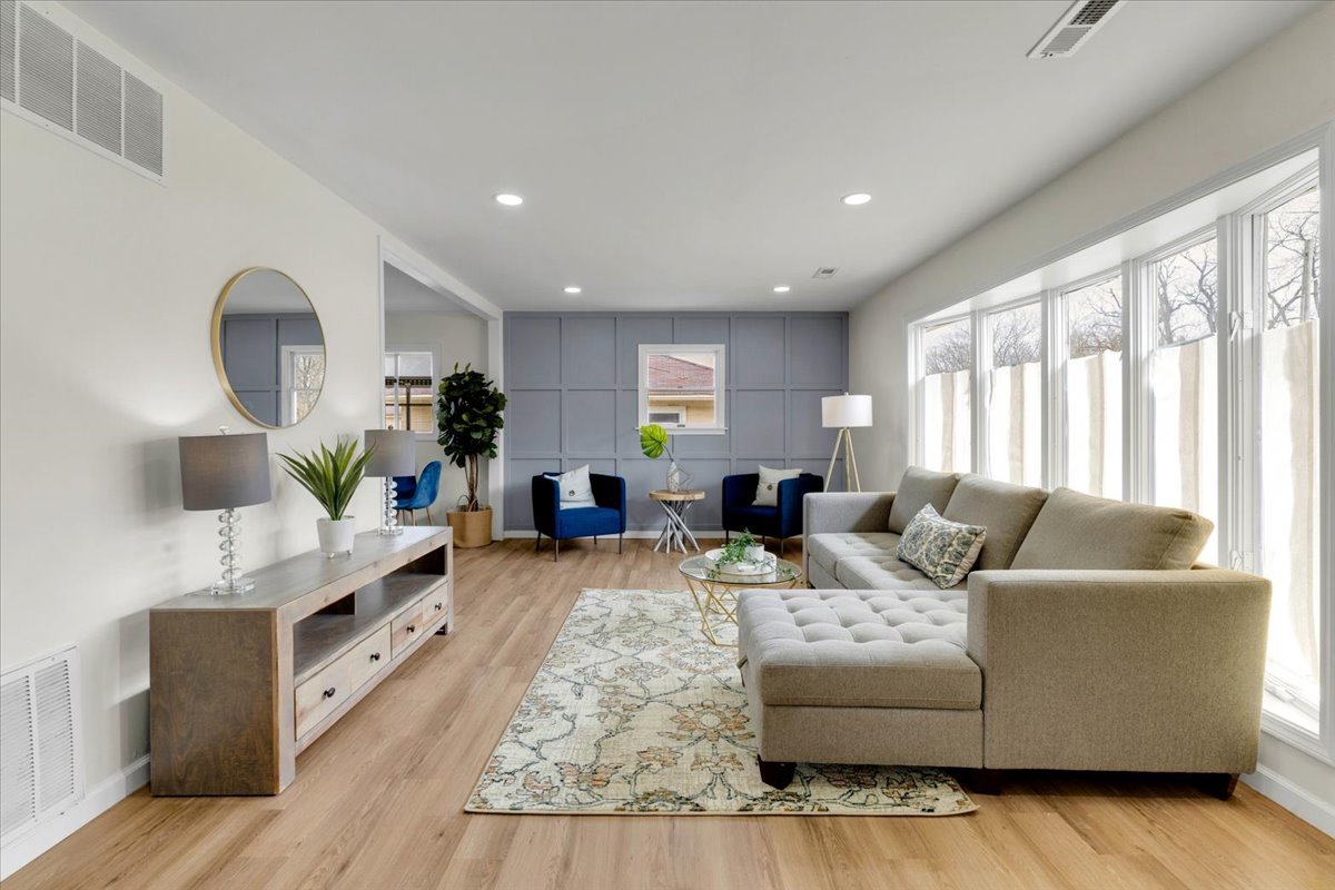 192 Monee Road Park Forest, IL 60466 - Photo 5 of 25 a living room with furniture and a large window