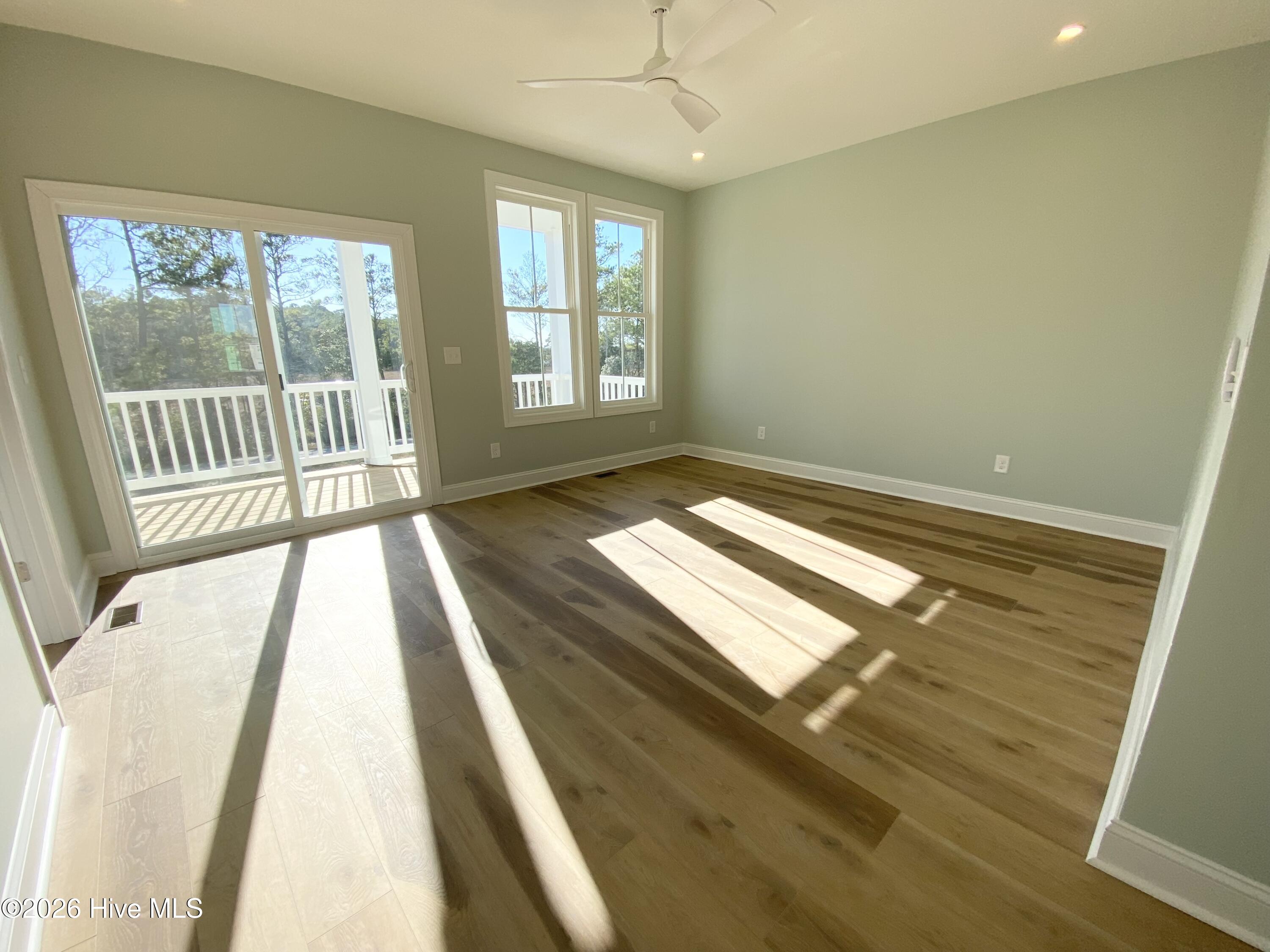 111 Jade Street Beaufort, NC 28516 - Photo 60 of 72 Bright Master suite with deck access