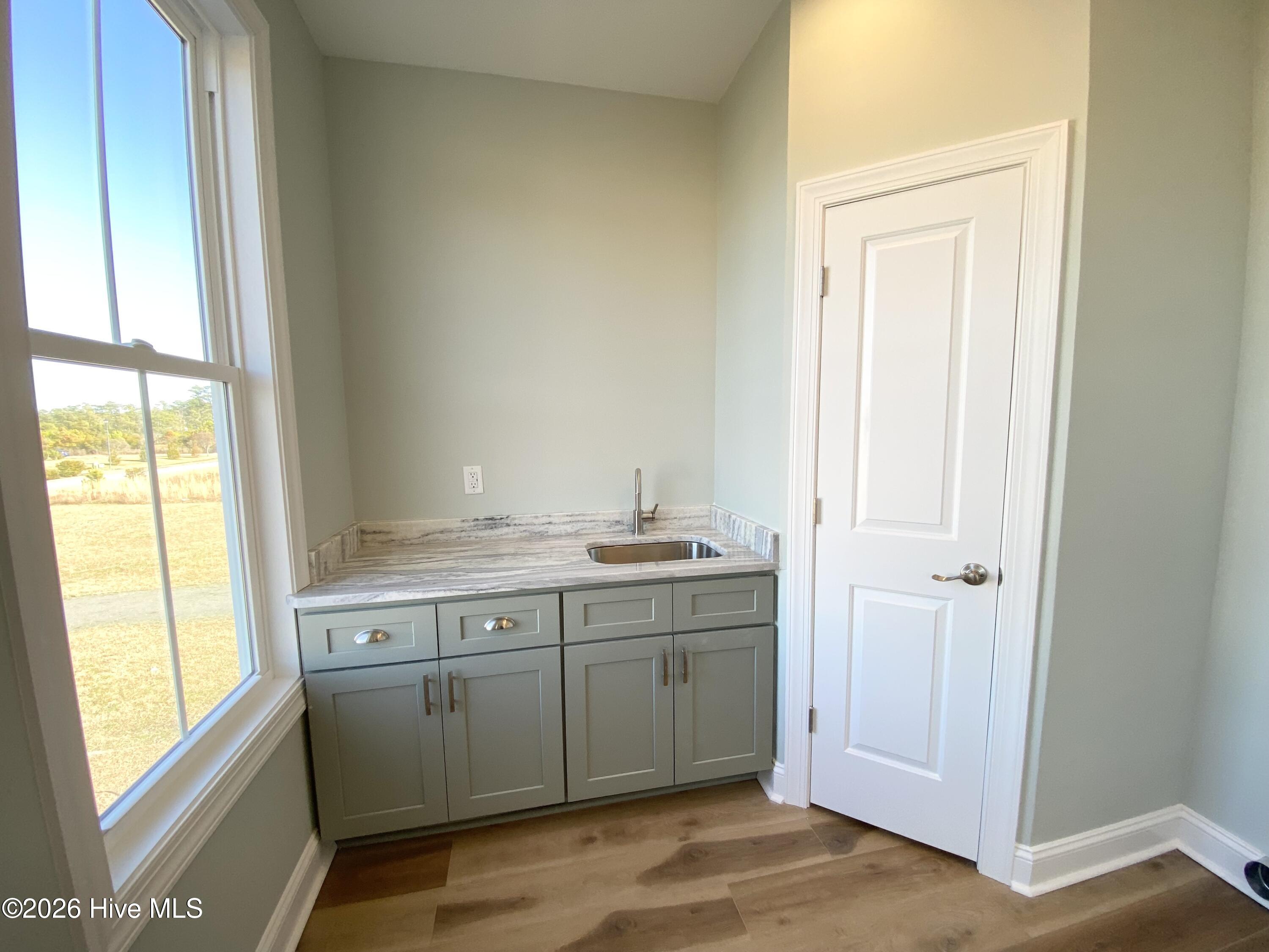 111 Jade Street Beaufort, NC 28516 - Photo 8 of 72 Laundry sink, cabinets and pantry