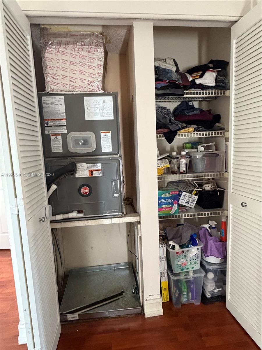 13267 Southwest 9th Lane Miami, FL 33184 - Photo 18 of 53 a room with storage and utility