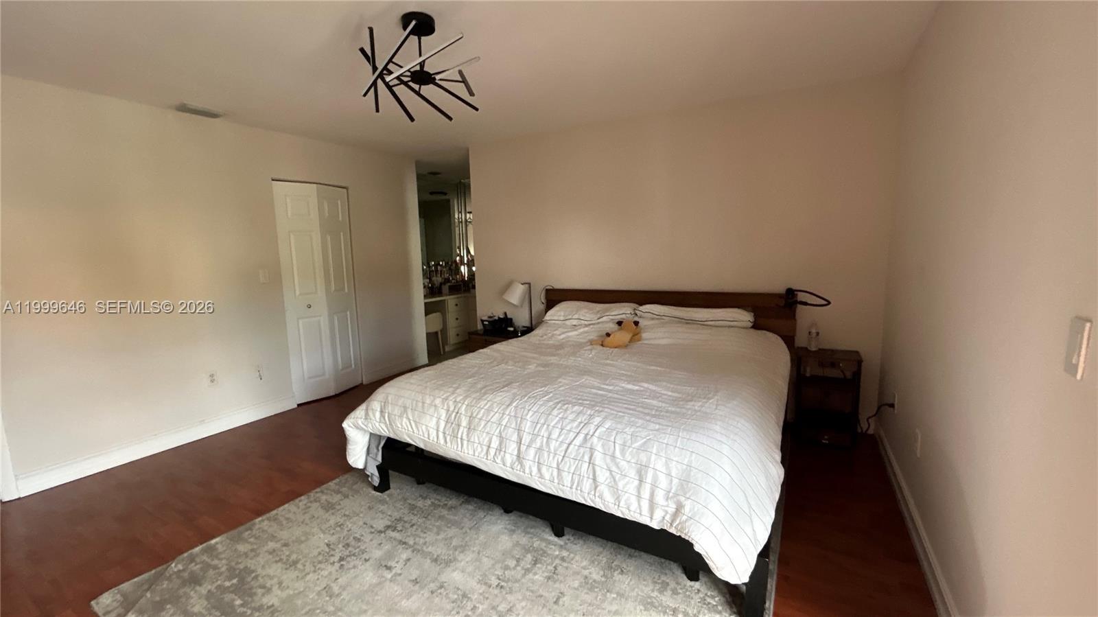13267 Southwest 9th Lane Miami, FL 33184 - Photo 25 of 53 a bedroom with a bed and window