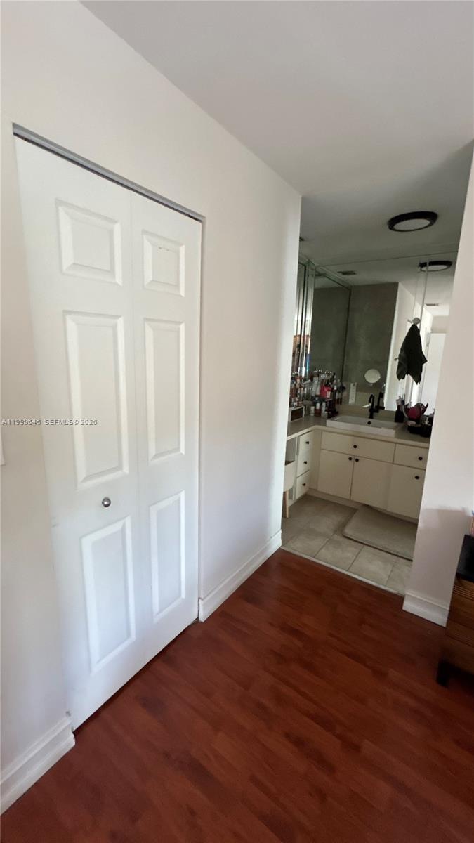 13267 Southwest 9th Lane Miami, FL 33184 - Photo 29 of 53 a view of a livingroom with wooden floor and furniture