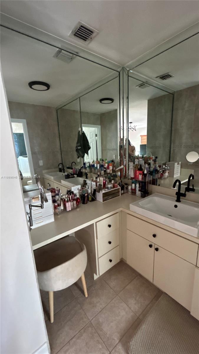 13267 Southwest 9th Lane Miami, FL 33184 - Photo 32 of 53 a kitchen with sink cabinets and appliances