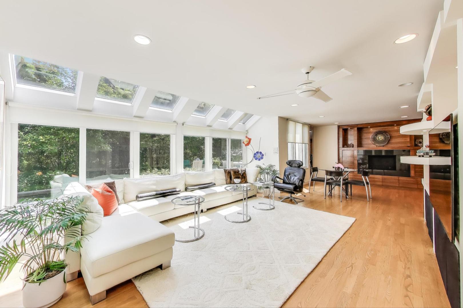 90 Riparian Road Highland Park, IL 60035 - Photo 20 of 76 a living room with furniture and large window
