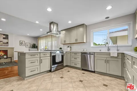a large kitchen with cabinets