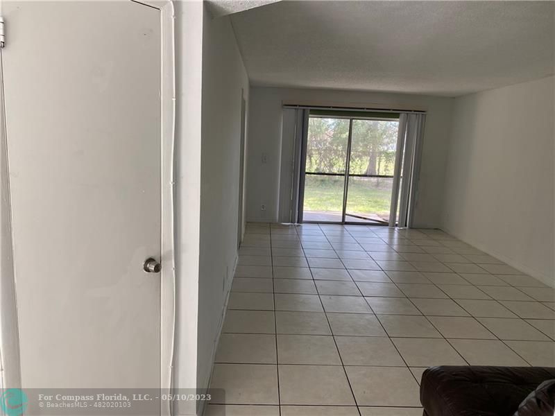 8020 Fairview Drive, Unit 101 Tamarac, FL 33321 - Photo 5 of 15 a view of an empty room and window