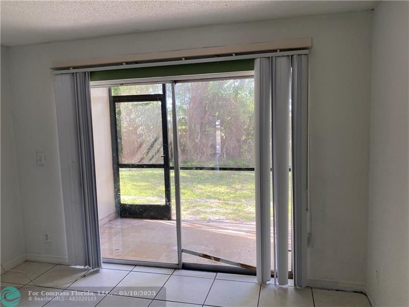 8020 Fairview Drive, Unit 101 Tamarac, FL 33321 - Photo 6 of 15 a view of an empty room and window