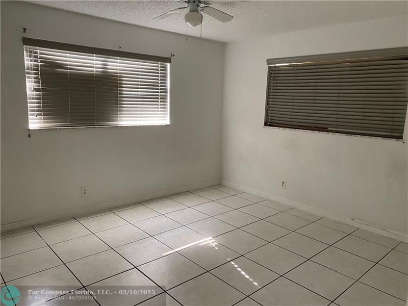 8020 Fairview Drive, Unit 101 Tamarac, FL 33321 - Photo 9 of 15 a view of a livingroom and window