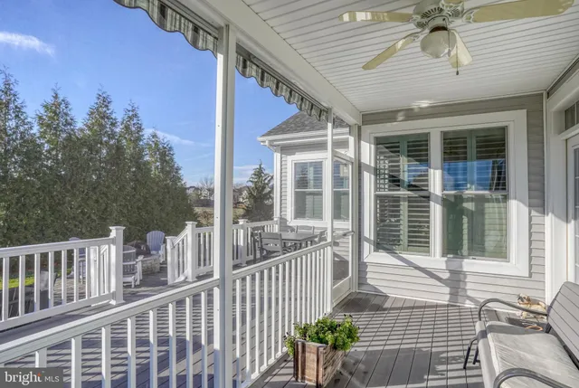 a view of yard with seating area and trees around