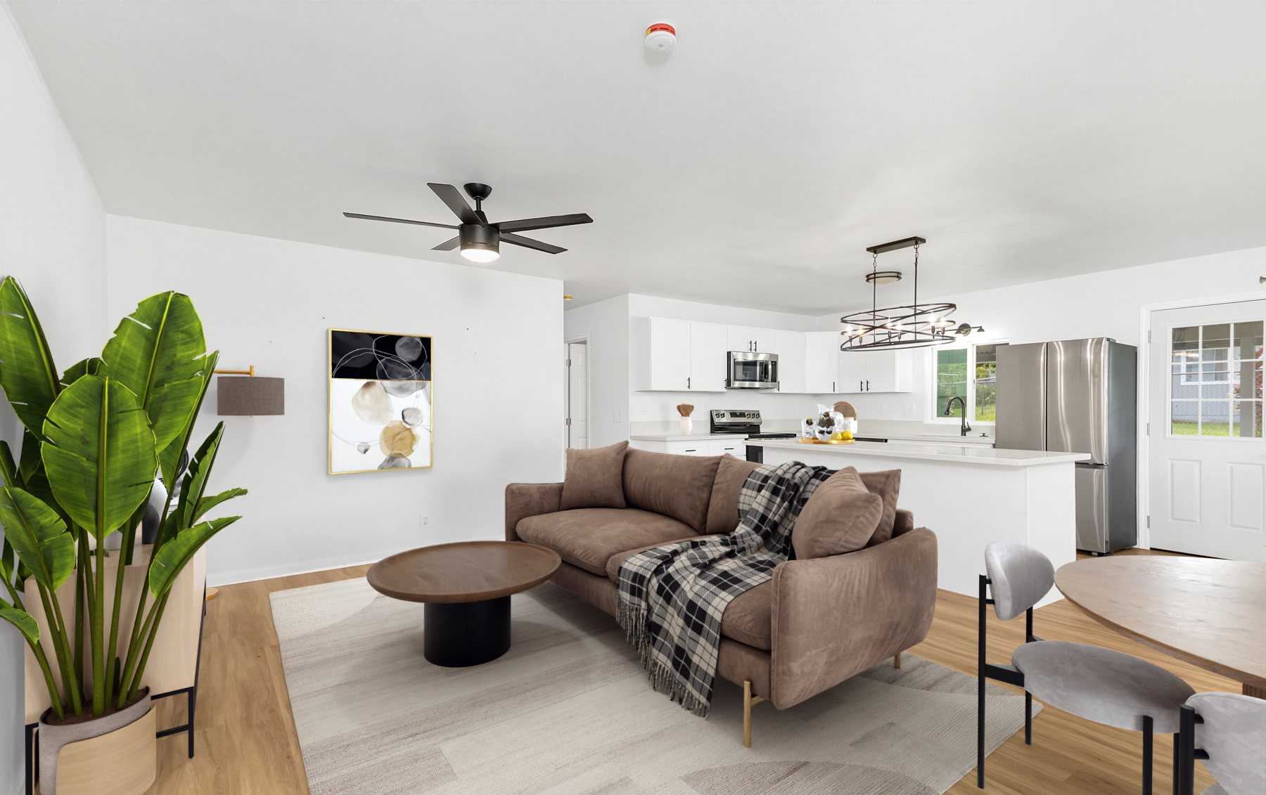 15-385 Puni Makai Loop North Pahoa, HI 96778 - Photo 1 of 22 a living room with furniture a couch and a potted plant