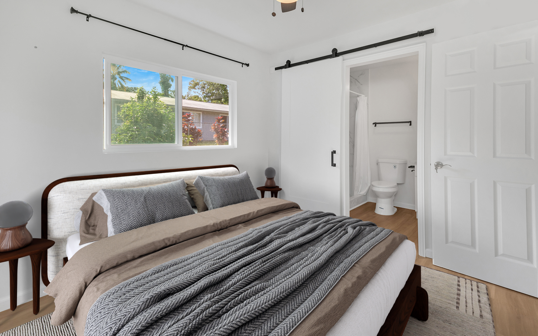 15-385 Puni Makai Loop North Pahoa, HI 96778 - Photo 13 of 22 a bedroom with a bed and a window