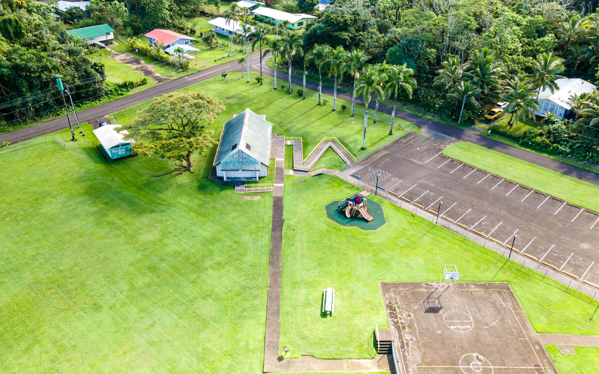 15-385 Puni Makai Loop North Pahoa, HI 96778 - Photo 3 of 22 a view of a play ground with an outdoor space