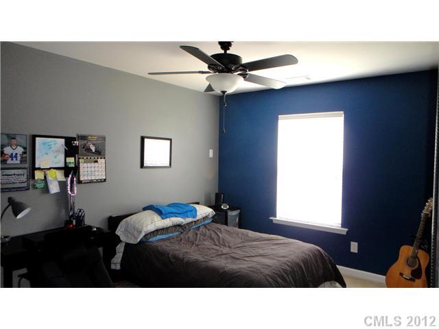 3343 Streamside Drive Davidson, NC 28036 - Photo 12 of 16 a bedroom with a bed and a window