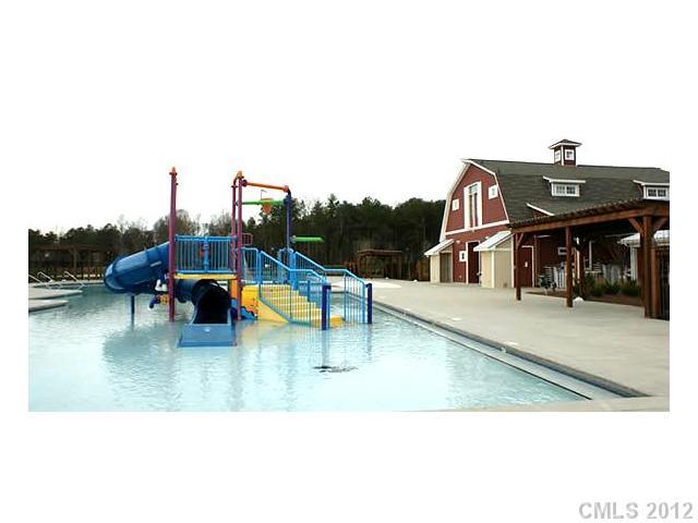 3343 Streamside Drive Davidson, NC 28036 - Photo 15 of 16 a view of a swimming pool with a lounge chairs