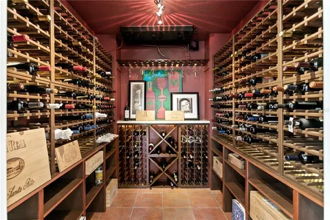 walk in closet with wooden floor