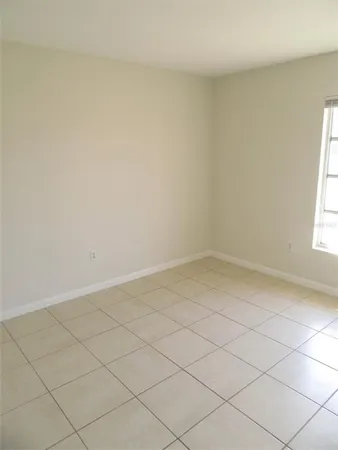 an empty room and a window