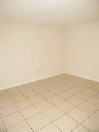 a view of wooden floor and cabinet
