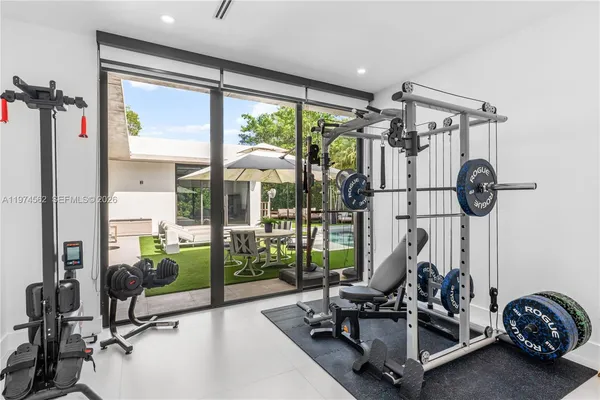 a view of a room with gym equipment